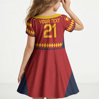 Kids red short-sleeve soccer dress, yellow trim, navy side panels, back number 21 graphic