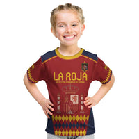 Kids red soccer T-shirt with Spain crest, diamond pattern, navy sleeves and yellow trim