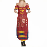 Women's red sleeveless maxi dress back with yellow trim, number 21 and crest graphic