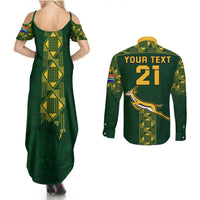 Green maxi dress with open shoulders, and matching back-print long-sleeve button shirt