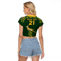 Women’s green cropped raglan rugby T-shirt with back text and number 21