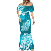 Aqua off-shoulder fitted mermaid maxi dress with white floral tribal pattern and ruffle hem