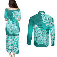 Turquoise puletasi dress and long-sleeve button shirt set, back view floral tribal print