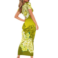Side view yellow bodycon dress with short sleeves and large floral tribal pattern