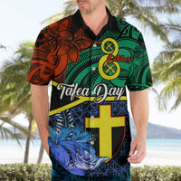 Multicolor Hawaiian shirt with yellow diagonal band, blue floral print, yellow cross shield
