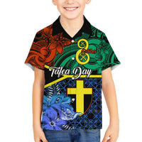 Kids Hawaiian button-up with black collar, blue flowers, and yellow cross shield graphic