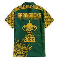 Green Hawaiian rugby shirt back, SPRINGBOKS and 2023 emblem, South Africa map graphic.