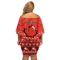 Red off-shoulder short dress with Christmas graphic, back view