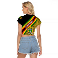 Cropped black raglan T-shirt with Zimbabwe flag-style back graphic and geometric pattern