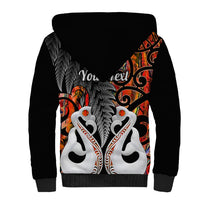 Black sherpa hoodie back with large Maori fern and fish graphic and Your text print