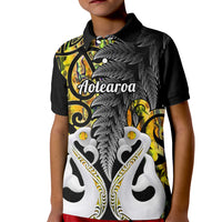 Kids polo shirt, black with gold accents and large grey bird graphic, button-front collar