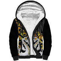 Black sherpa hoodie with full-zip front, hood lining, and gold fern and tiki-style graphic