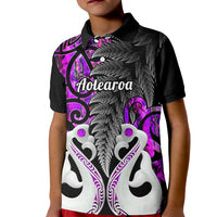 Kids polo shirt with black collar and purple graphic front, short sleeves