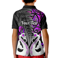 Kids polo shirt back view with black and purple tribal design, short sleeves