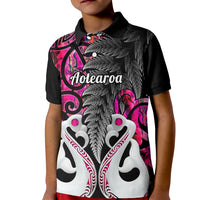 Kids' black polo shirt with pink fern and koi-inspired graphic front