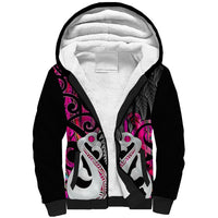 Black sherpa hoodie with pink Maori-style graphic on front and sherpa-lined hood