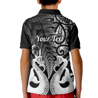 Kids black polo shirt with back fern and Maori art print, ribbed collar