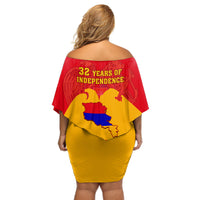 Off-shoulder short dress with red back showing 32 years of independence text, yellow skirt