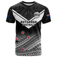 Black football T-shirt with Aotearoa Football print, Maori fern pattern, stars and flags