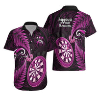 Men’s black Hawaiian shirt with dartboard and fern prints, back text visible