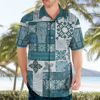 Men’s dark cyan tropical patchwork button-up shirt with leaf and tiki motifs