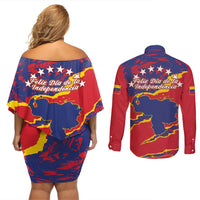 Back view of red off-shoulder dress and button shirt set with Venezuela map graphic