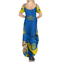 Blue sleeveless maxi dress with cold-shoulder cutouts, yellow trim, flag-style print