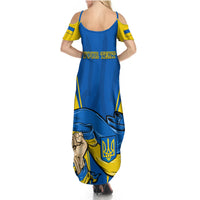 Women’s blue maxi dress back view with thin straps, yellow shoulder trim, patriotic print