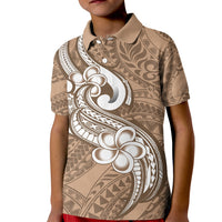 Kids brown polo shirt with white tribal plumeria print and buttoned collar