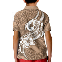 Kids brown polo shirt, back view, white tribal plumeria graphic