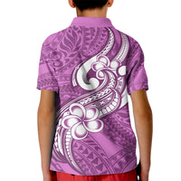 Kids purple polo shirt, back view with white floral and tribal graphic, short sleeves