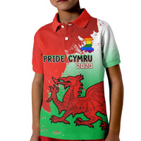 Kids red polo shirt with Pride Cymru 2023 graphic, multicolor dragon and Welsh dragon detail