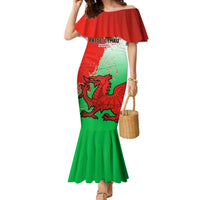 Off-shoulder mermaid dress, red top and green skirt with dragon graphic