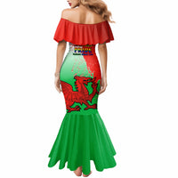 Off-shoulder mermaid dress, red top and green skirt with dragon graphic, back view