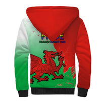 Red and green sherpa hoodie with hood up, dragon back print and black ribbed cuffs