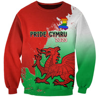 Red and green unisex sweatshirt with Pride Cymru 2023 graphic and dragon front