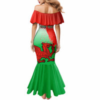 Off-shoulder mermaid dress in red and green with Welsh dragon print and ruffled neckline