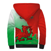 Sherpa hoodie back view, red and green dragon print, black ribbed hem and cuffs