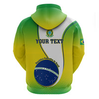 Green, yellow, and white zip-up hoodie back view with Brazil emblem and flag graphic.