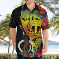 Adult black Hawaiian shirt front with tropical flowers and cross crest graphic