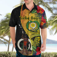 Black Hawaiian shirt with Torba Bay graphic, tropical flowers, and button-up collar