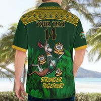 Back view of green rugby Hawaiian shirt with yellow trim, 'YOUR TEXT 14' and mascots.