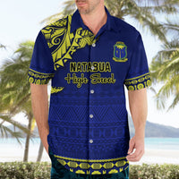 Blue Hawaiian shirt with yellow tapa pattern, NATABUA High School text and crest, short sleeves