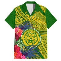 Green button-up Hawaiian shirt with yellow geometric pattern, lion crest and tropical flowers