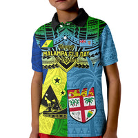 Kids polo shirt with black collar and blue-green graphic front panel, short sleeves