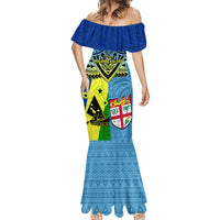 Blue off-shoulder mermaid maxi dress with ruffled sleeves and vertical patterned graphic