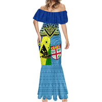 Blue off-shoulder mermaid maxi dress with ruffled neckline and patchwork Polynesian panel