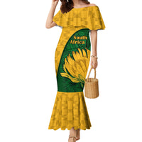 Women's mermaid dress in yellow with green floral center panel and ruffled off-shoulder