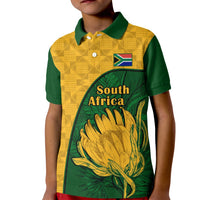 Kids yellow and green polo shirt with South Africa print, Kente pattern, flower emblem