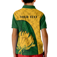 Kids yellow and green polo shirt back print with large flower, Kente pattern